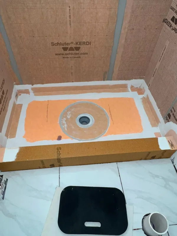 Shower drain and waterproofing during installation