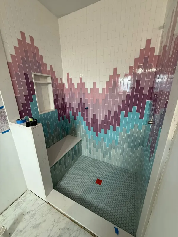 Colourful geometric wall tile installation