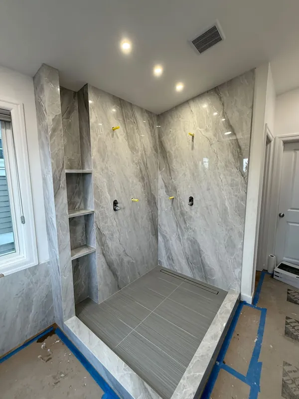 Shower tile and bench during installation