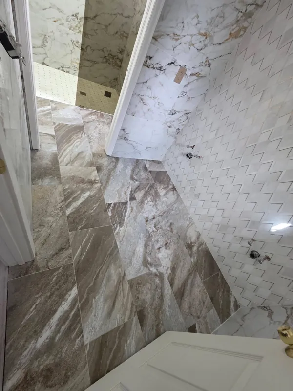 Large-format shower wall tile and inset niche