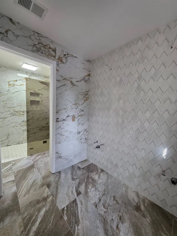 Bathroom with marble-look wall tile