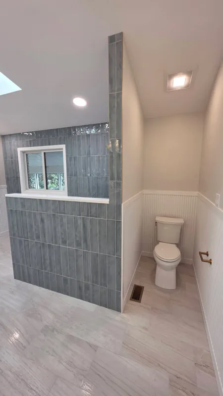 Shower half wall and bathroom vanity